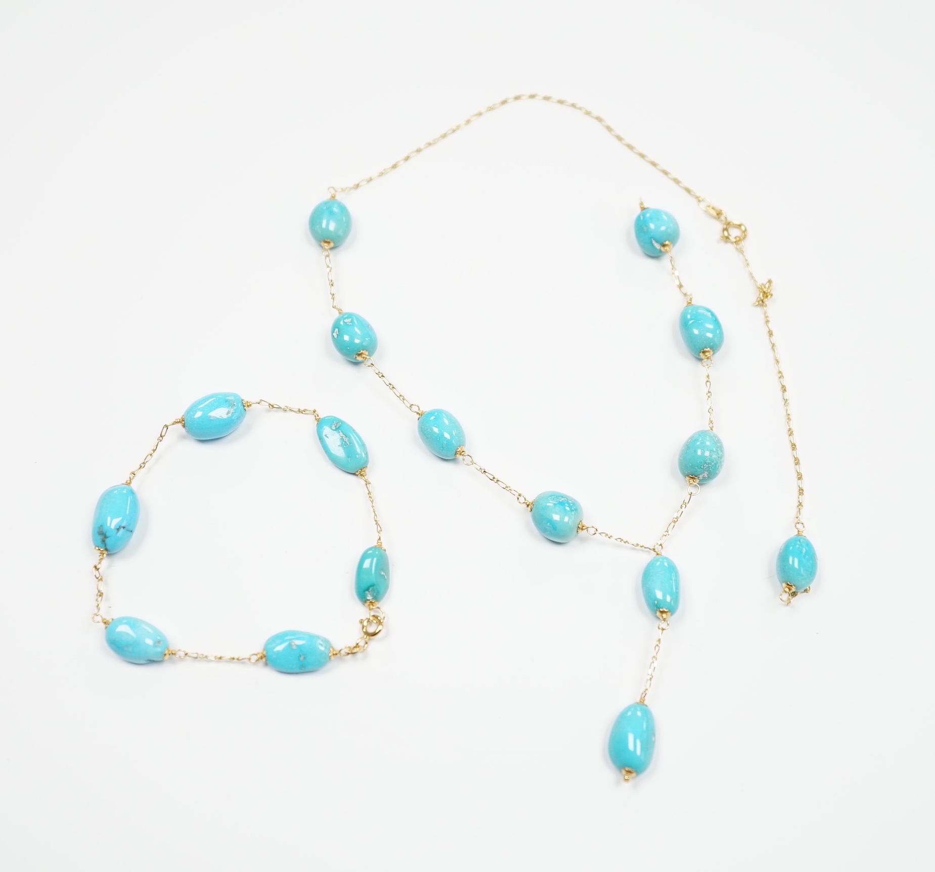 A modern Italian 750 and turquoise set drop necklace (a.f.), 54cm and a matching bracelet, gross weight 24.6 grams.